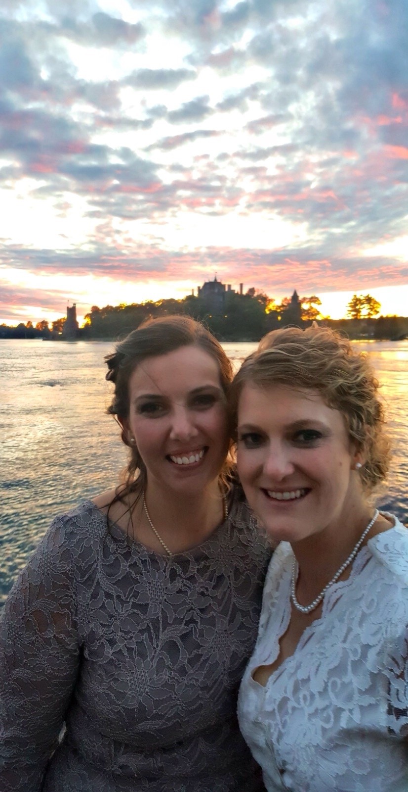 Alissa Davis and her wife, Paige Neuenschwander, on their wedding day Alissa and her wife in front of sunset