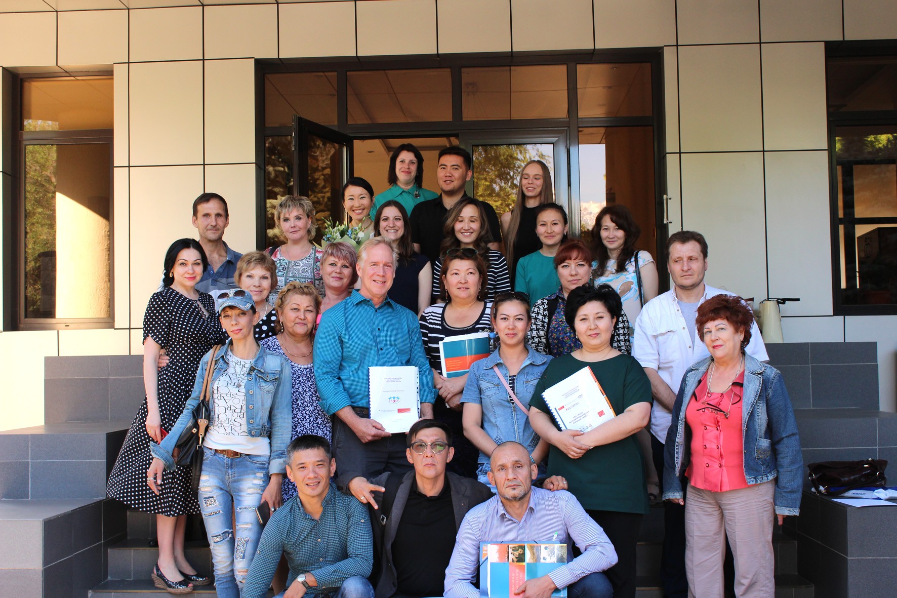 Photo of BRIDGE study trainees standing in a group in Almaty 