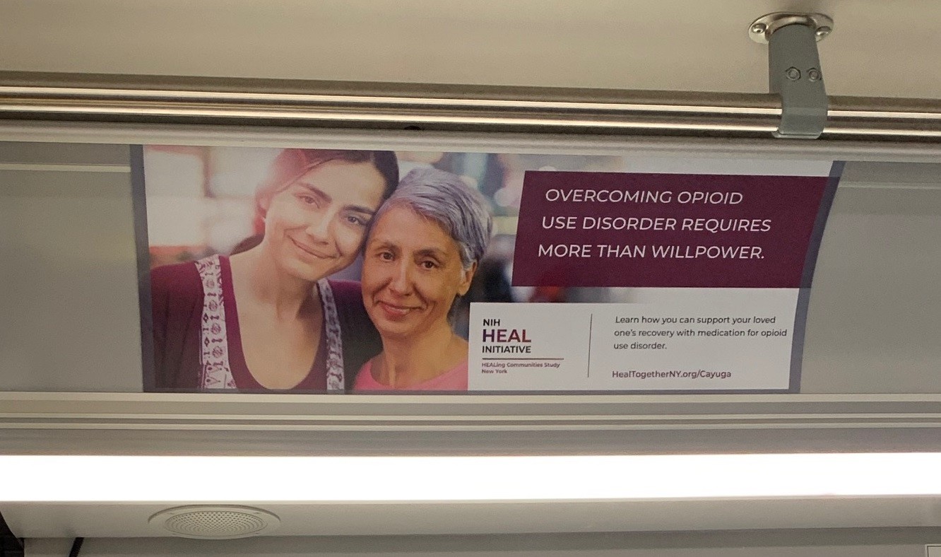 Sign inside buses: "Overcoming opioid use disorder takes more than willpower."