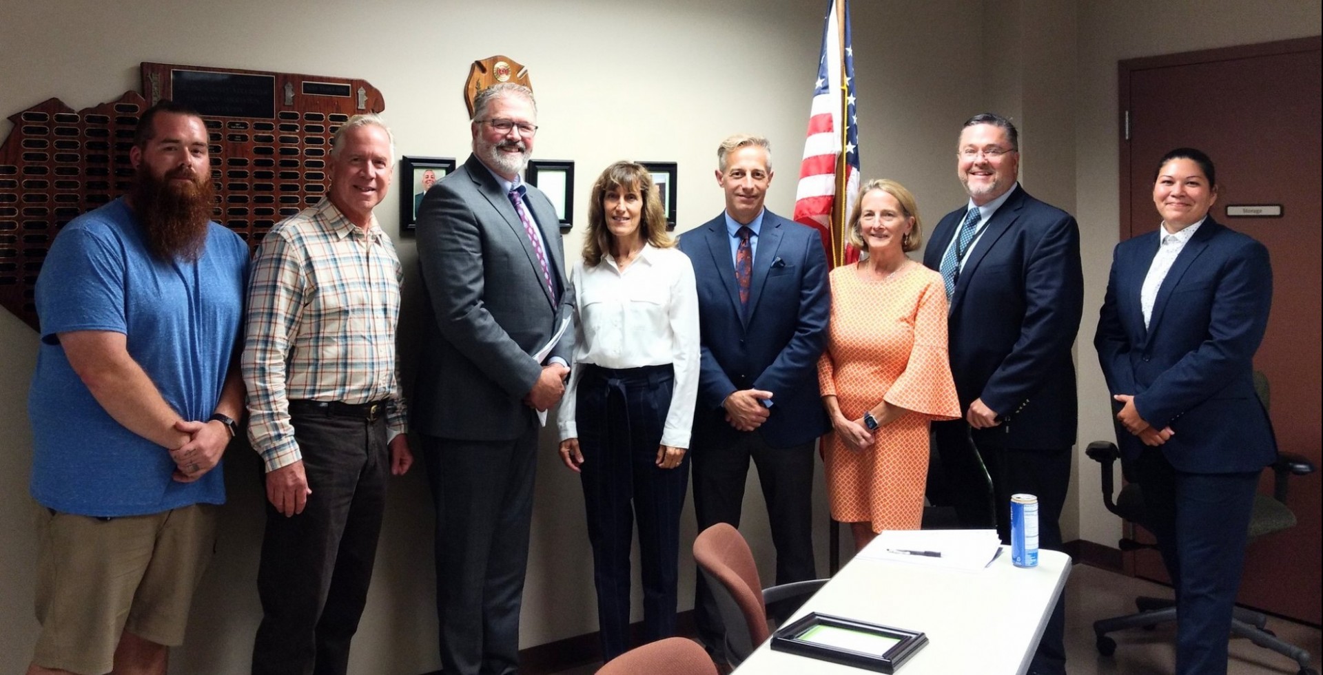 The HCS Greene County coalition, the NYS Unified Courts, & Policy Research partner to launch a court to meet needs of people with OUD in justice system. L-R: Jason Shook (peer advocate), Dr. Timothy Hunt, Hon. Charles Tailleur, Barbara Downy (Drug Court Coordinator) Jason Fredenberg Psy D, (Director of Community Services) Lisa Callahan PhD, consultant from Policy Research Associates, Dennis Reilly, Office of the Court Administration (OCA), Susan Strugess, OCA photo of people standing in an office room