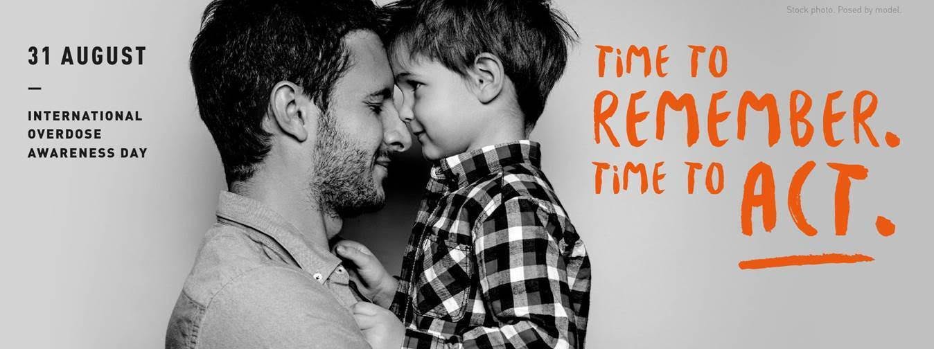 father and son with statement time to remember to act for international od awareness day