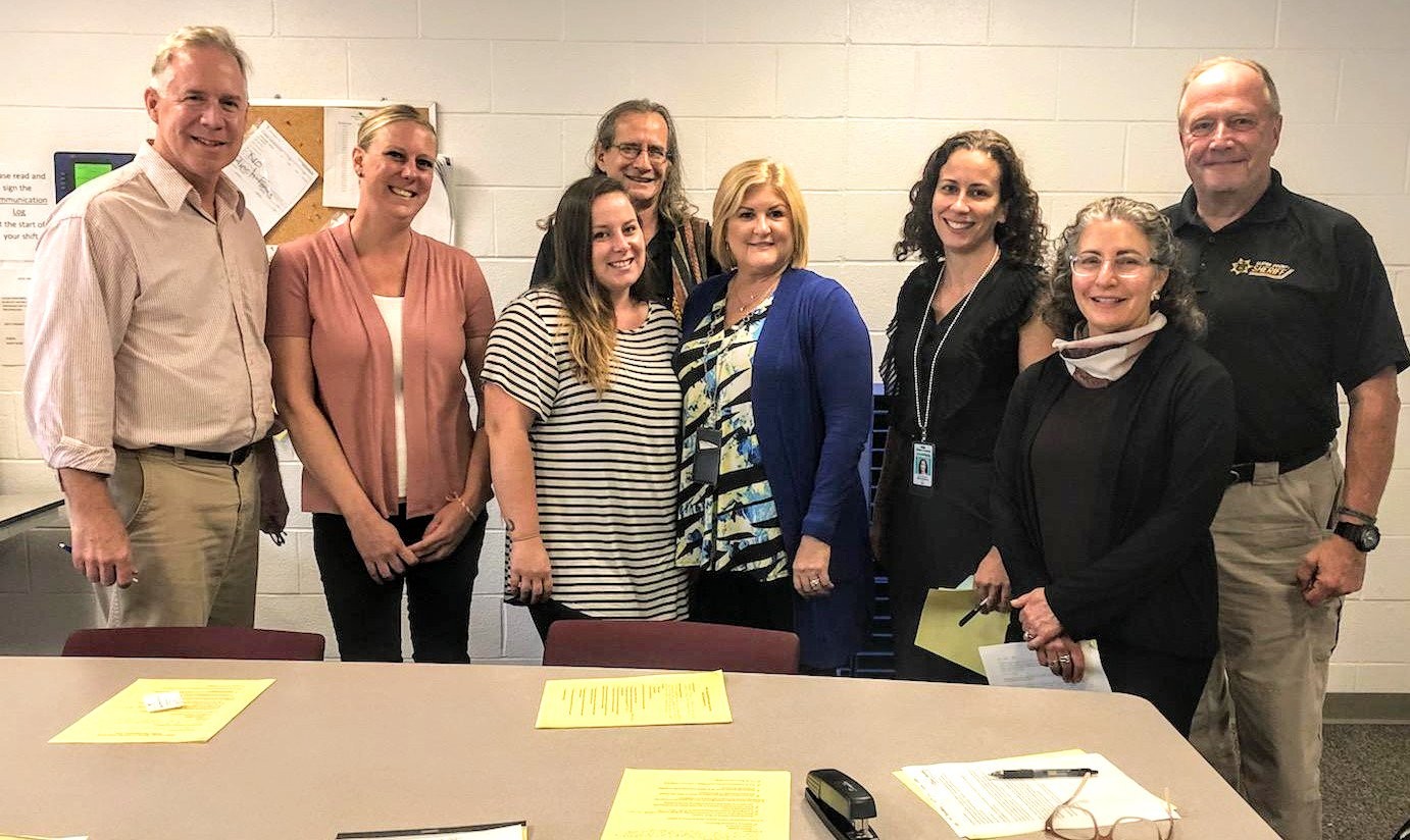 It takes jail l administrators, correctional medical care leadership, county program leadership and community-based services with commitment to address the Opioid Crisis in correctional settings Group including SIG standing at a corrections partner facility