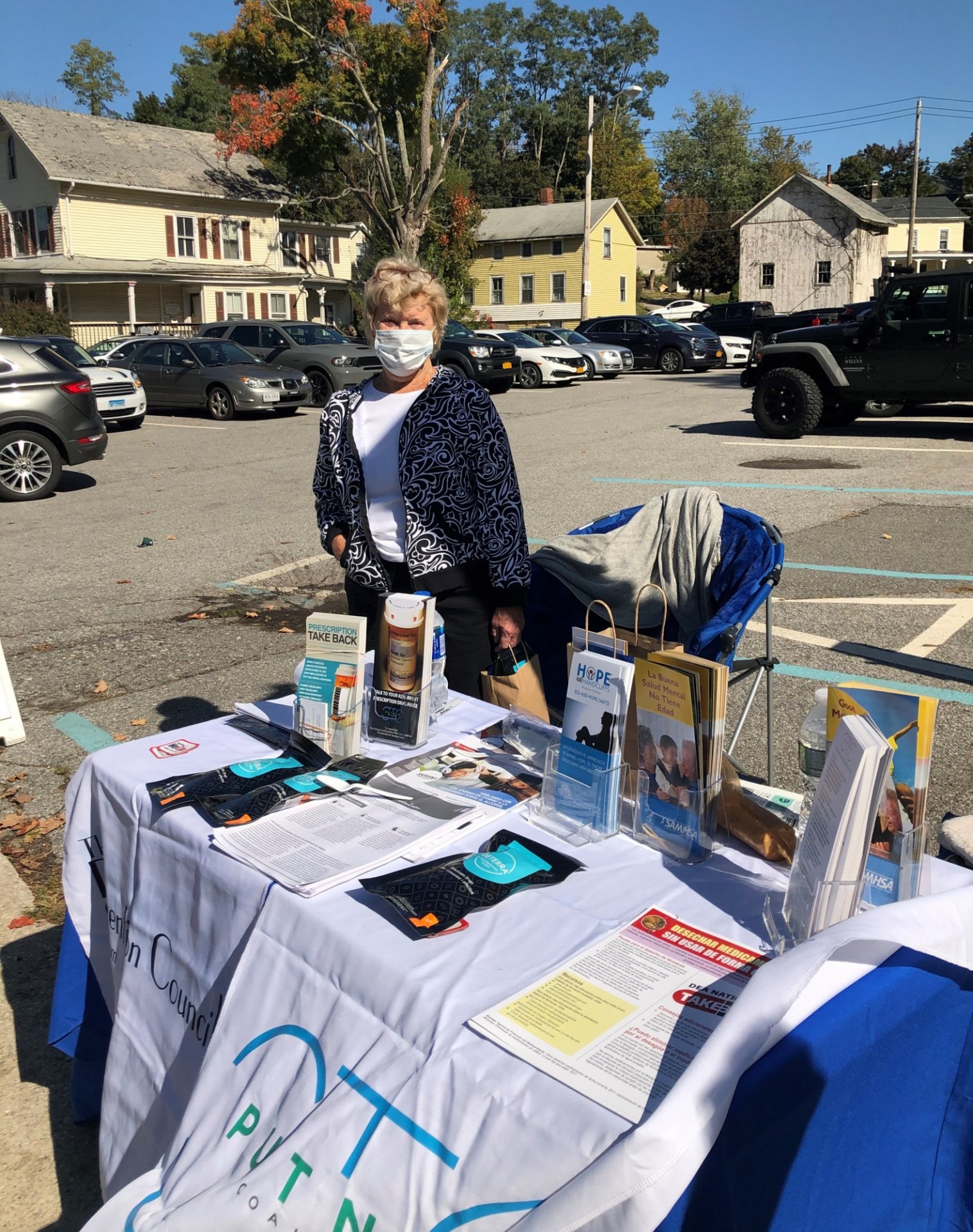 Mary Bryde, Village of Brewster Trustee, lends a hand at the Bilingual  Brewster Pop-up Narcan Training event