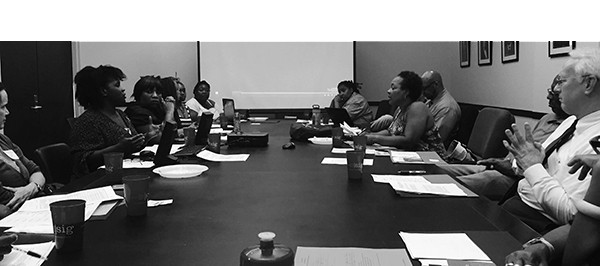Community Collaborative Research Network meeting people meeting at a table
