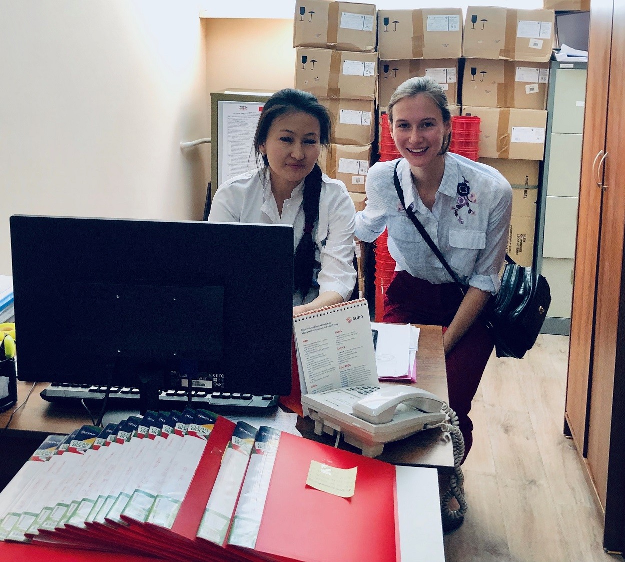 Sophia and a nurse at a Trust Point which provides HIV rapid testing and counseling in Almaty, Kazakhstan