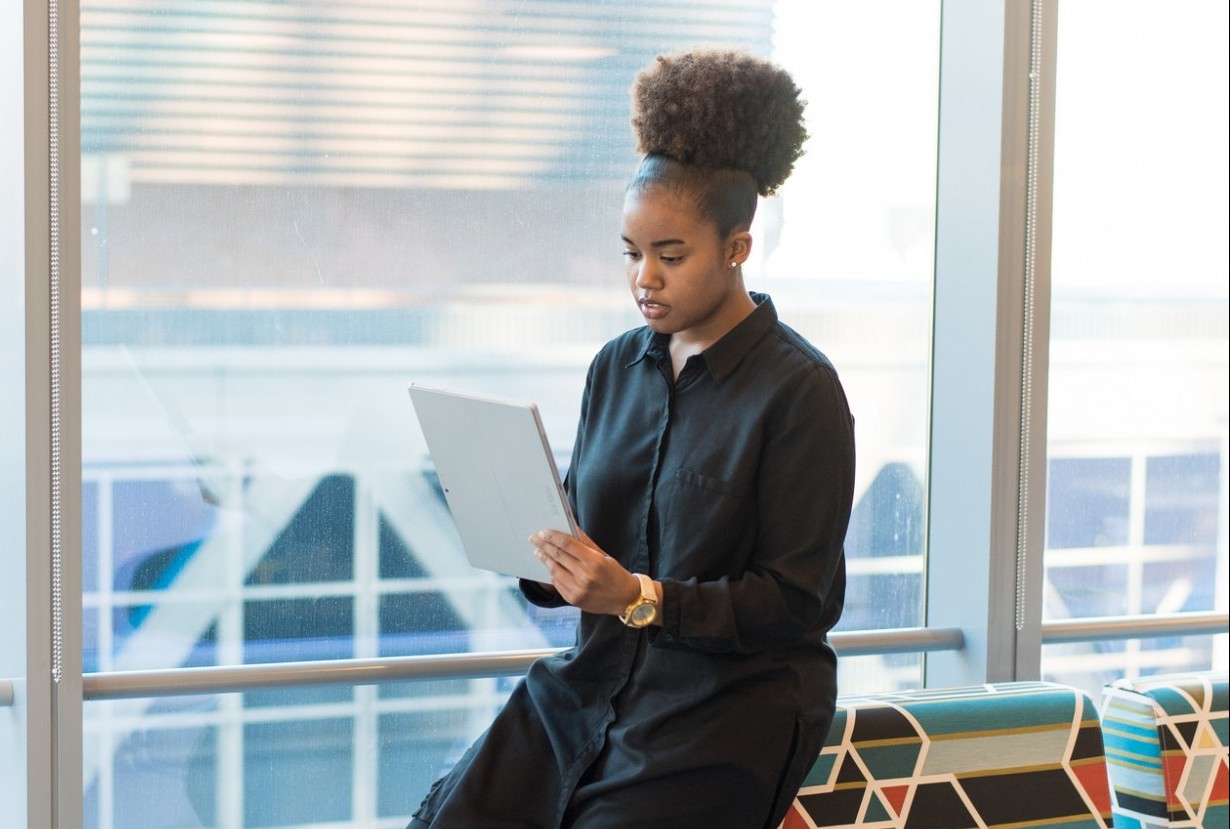 Black woman using ipad