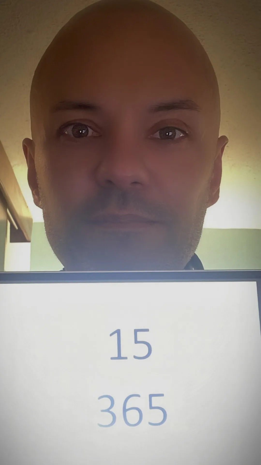 Photo of Andrea with his numbers 