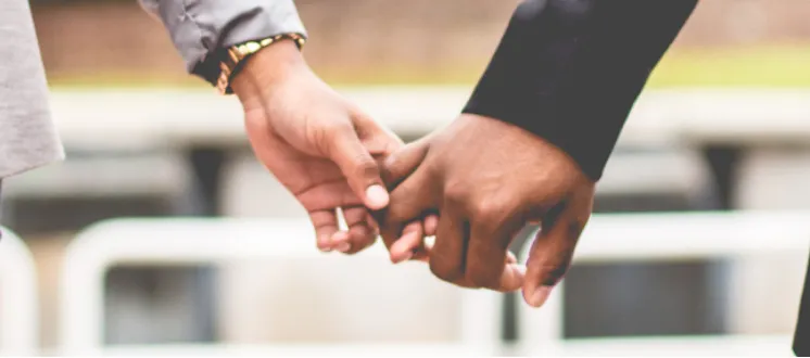 Couple holding hands