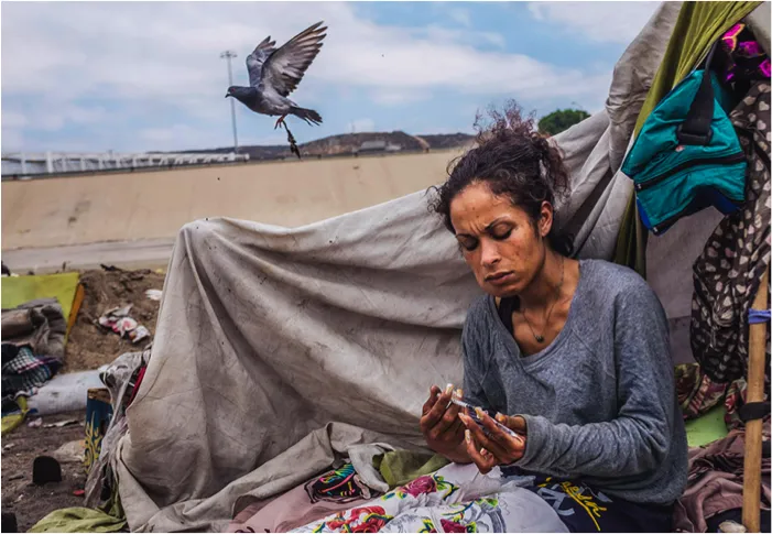 Woman injecting drugs. Photo Credit: Malcolm Linton/Polaris