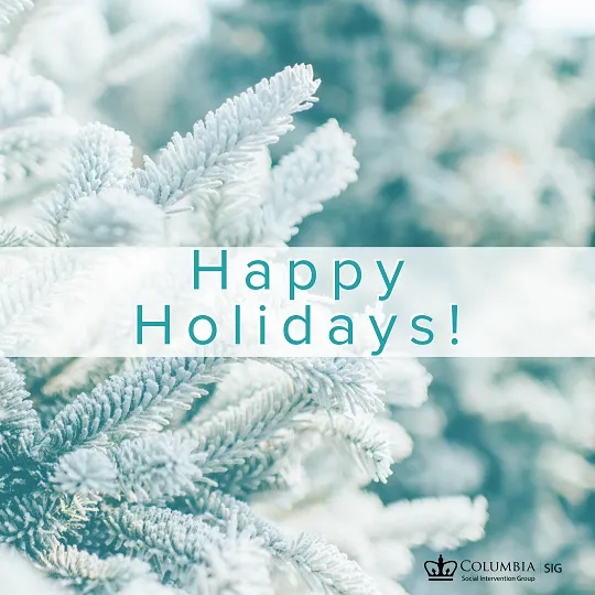happy holidays greeting with snow and an evergreen covered in snow