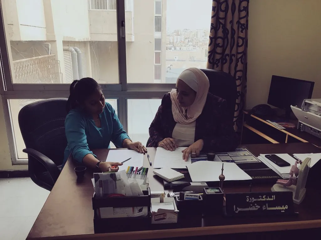 Anindita and Maysa Khadra working together